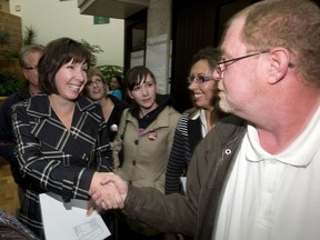 Saskatoon city council Ward 3 candidate Rick Steernberg, right, concedes victory to Ann Iwanchuk at city hall during a byelection  on Oct. 19, 2011.