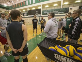 Brian Gavlas speaks to his Huskie men's volleyball team before heading to nationals in 2016.