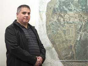 La Loche Mayor Robert St. Pierre stands for a photograph in the boardroom of his office in La Loche, SK on Thursday, February 22, 2018.