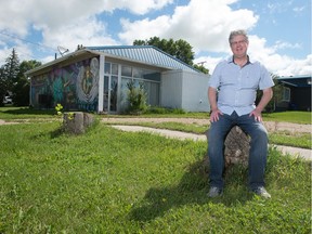 Gary Island sits in front of his home in Wilcox, Saskatchewan on July 18, 2020. Island plans to turn his home into a music venue. The building is an old bank, from which the vault has been preserved. BRANDON HARDER/ Regina Leader-Post