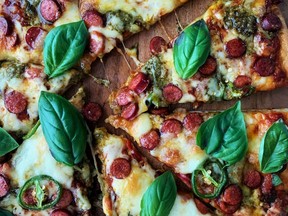 Pepperoni pizza with basil and honey (Renee Kohlman)