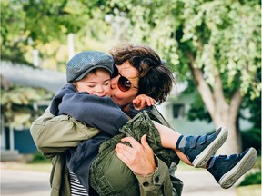 Kath Stevenson holds her six-year-old son Hugo. Stevenson is torn on whether to send her immunocompromised son back to school amid the COVID-19 pandemic.