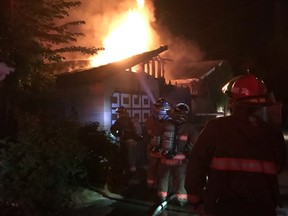 Saskatoon firefighters responded to a garage fire on Ninth Avenue North on Aug. 10, 2020.