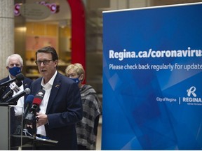 Regina Mayor Michael Fougere stands with members of city council to encourage mask use in public indoor spaces at the Cornwall Centre in Regina , Thursday, August, 13, 2020.