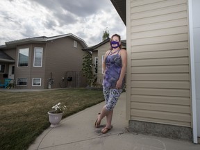 Gale Estell outside of her home in Martensville, SK on Saturday, August 22, 2020. Estell says that navigating the world before COVID-19 was a struggle for her as a deaf woman, but now she's felt an increased sense of anxiety when in public. She relies on reading lips to understand people but full coverage face masks feels like there is a "blanket over communication." While she supports the use of masks, she hopes that more people, and especially health centres, will adopt the window face masks for more accessibility of people who are deaf and hard of hearing.