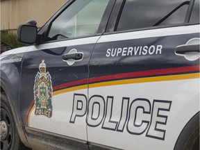 Saskatoon Police say slippery road conditions played a role in the arrest of a man operating a stolen vehicle and while prohibited from driving.
