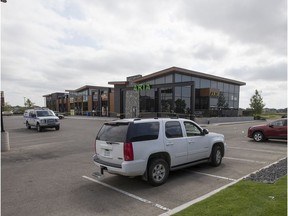 Saskatoon police had an area around a Lakewood Suburban Centre restaurant taped off and officers remained at the scene early Friday afternoon.