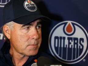 Edmonton Oilers head coach Dave Tippett speaks to the press during training camp at Rogers Place on Sept. 18, 2019.