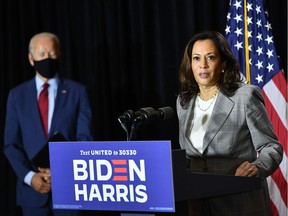 Democratic presidential nominee, former US Vice President Joe Biden (L), and vice presidential running mate, US Senator Kamala Harris, hold a press conference after receiving a briefing on COVID-19 in Wilmington, Delaware, on August 13, 2020. (Photo by MANDEL NGAN / AFP)