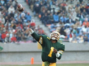 Warren Moon releases a pass with the Edmonton Eskimos. Postmedia files.