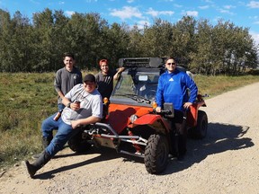 From left to right youth Damion Kahpeaysewat, Darrick Adams, Kyler Albert and Seed 2 Leaf owner Daryl Wright at work in Elk Island, Alberta. Photo provided by Daryl Wright