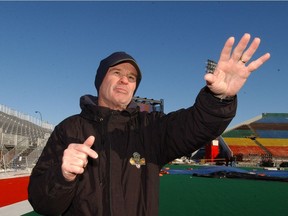 Hugh Campbell conducts a tour of Hughie's Haven — Taylor Field's north end zone — during Grey Cup week in 2003.