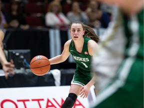University of Saskatchewan Huskies guard Libby Epoch dribbles the ball against Laval Rouge et Or in U Sports Final 8 women's basketball championship semifinal action Saturday, March 7 in Ottawa.