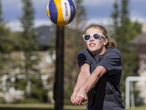 Emjay Koller bumps the ball during the King and Queen of the Beach three day beach volleyball tournament at Father Robinson school in Saskatoon on Wednesday, September 2, 2020.
