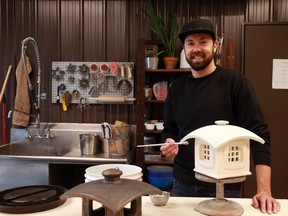 Saskatoon Clayworks owner Chad Berg works on one of his lanterns at his teaching studio that focuses on different types of ceramic art with classes for both advanced and beginner potters.