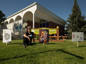 Marilyn Irwin set up an art display outside the Canadian Mental Health Association building to commemorate victims of suicide.