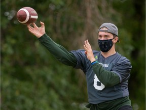 Saskatchewan Huskies' quarterback Mason Nyhus makes a throw during the team's Wednesday-night practice.