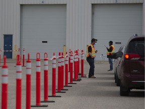 Drive-thru COVID-19 testing sites like the one pictured here in Saskatoon might be used to provide flu shots during off hours.