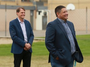 Saskatoon Tribal Council Chief Mark Arcand, right, and Saskatoon Mayor Charlie Clark on Sept. 15, 2020.