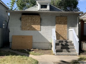 The house in the 400 block of Avenue G South where human remains were found Tuesday, was boarded up on Thursday. The house was the site of an incendiary fire on Aug. 22. Photo taken Sept. 17, 2020 by Thia James/Saskatoon StarPhoenix.