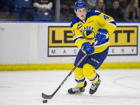 Saskatoon Blades defenceman Rhett Rhinehart moves the puck against the Regina Pats during the first period of WHL action at SaskTel Centre in Saskatoon on Wednesday, February 5, 2020.