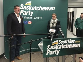 Saskatchewan Party Leader Scott Moe announced Sunday that Chris Guérette, right, would replace Daryl Cooper as the party's nominee for Saskatoon-Eastview. Cooper resigned Saturday after his history of sharing and promoting conspiracy theories online was brought to light.