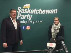 Saskatchewan Party Leader Scott Moe announced Sunday that Chris Guérette, right, would replace Daryl Cooper as the party's nominee for Saskatoon-Eastview. Cooper resigned Saturday after his history of sharing and promoting conspiracy theories online was brought to light.