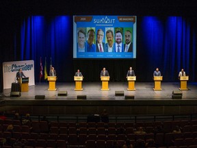 Mayoral candidates Charlie Clark, Don Atchison, Rob Norris, Cary Tarasoff, Mark Zielke and Zubair Sheikh at the first mayoral debate of the civic election campaign.