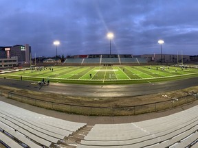 The University of Saskatchewan Huskies' football team practices on their new turf field at Griffiths Stadium Wednesday night.