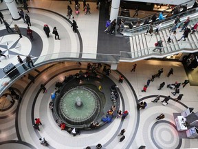 Shoppers in the Toronto Eaton Centre before the pandemic. Cadillac Fairview removed the cameras from its digital directory kiosks in 2018 when the privacy commissioners launched the probe.