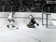 The Montreal Canadiens' Guy Lafleur swoops in on Vancouver Canucks goaltender Gary Bromley, a former Regina Pat, during a 1979 NHL game.