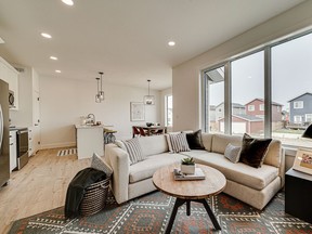 Arbutus Properties' newest show home, The Burke, located at 2023 Stilling Lane, has a compact footprint, but the open concept main floor has been designed to feel spacious and inviting. Photo: Scott Prokop Photography