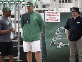 The Saskatchewan Roughriders' brain trust — general manager Brendan Taman (left), assistant GM Jeremy O'Day (centre) and head coach Corey Chamblin —is shown on July 3, 2015. Within two months, only O'Day was still a member of the organization.