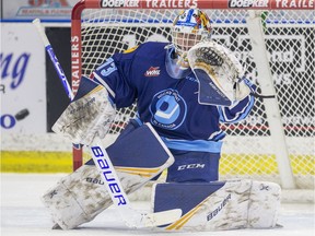 Saskatoon Blades goalie Nolan Maier stops a shot from the Regina Pats during first-period WHL action at SaskTel Centre in Saskatoon on Friday, March 6, 2020.