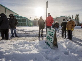 People line up outside the Lakewood Civic centre to cast votes in the municipal election in November 2020.