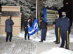 Before sunrise on Nov. 16, 2020 -- which is celebrated annually as Louis Riel Day -- members of the Saskatchewan RCMP and the Metis Nation-Saskatchewan jointly raised the Metis Nation flag outside the Saskatoon RCMP building in Saskatoon (pictured) and the Saskatchewan RCMP headquarters in Regina. (Photo courtesy Saskatchewan RCMP)