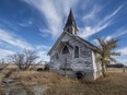 The church in Wartime, Sask. is boarded up. Only two families remain in the town.