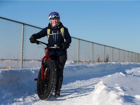 Susan Clarke, a sales associate at Bruce's Cycles, shares tips on how to safely bike outside in the winter. Photo taken in Saskatoon, SK on Friday November 20, 2020.