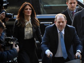 In this file photo taken on February 24, 2020 Harvey Weinstein arrives at the Manhattan Criminal Court in New York City.