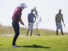 With social distancing in place, Ty Campbell chips for the green during the final round of the the 109th Saskatchewan Men's Amateur golf tournament. Photo taken in Warman on Friday, July 24, 2020.