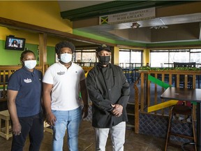 Sandra, Mikhail, and Donovan Mills run the Jamaica Food Basket.