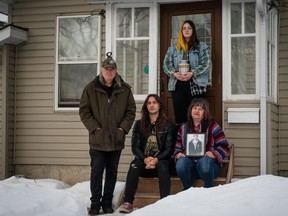 Jesse Irvine died of an overdose earlier this year. His father John, brother Jace, sister Brooklynn and mother Laurie Irvine pose with a picture of Jesse and his urn.