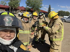 Saskatchewan firefighter Michelle Vandevord of Muskoday First Nation (left) is the first woman to be named president of the Aboriginal Firefighters Association of Canada. Photo supplied by Michelle Vandevord on Dec. 8. (Saskatoon StarPhoenix)