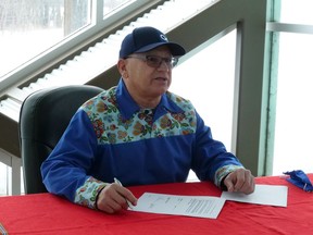 Métis Nation—Saskatchewan President Glen McCallum signs an agreement with Parks Canada over the Batoche National Historic Site. Photo provided by Métis Nation—Saskatchewan on Monday, December 21, 2020. (Saskatoon StarPhoenix)