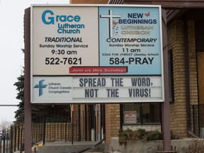 A sign on the Grace Lutheran Church on Victoria Avenue displays a message to passers by during the COVID-19 pandemic in Regina, Saskatchewan on March 25, 2020.