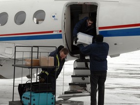Passengers board a West Wind Aviation plane in Regina in 2009. (Saskatoon StarPhoenix)