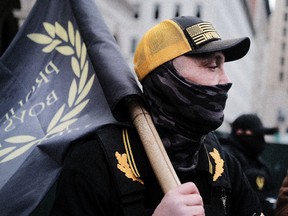 Members of the Proud Boys join other gun rights advocates in front of the State House as pro-gun supporters gather on January 18, 2021 in Richmond, Virginia.