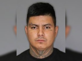 Paul Joseph Nicotine, 26, is charged with manslaughter in the death of a 14-year-old boy on Dec. 7, 2020. Saskatoon police say he is still at large.