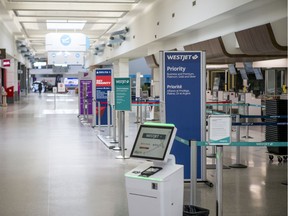 The terminal at the John G. Diefenbaker International Airport was nearly empty in the wake of reduced flights and increased restrictions on air travel. Photo taken on April 20, 2020.
