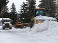 A snow removal crew at work in Nutana Park on Tuesday, Jan. 5, 2021.
